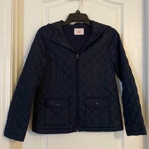 Kids navy blue quilt outer and fleece lined hooded jacket.